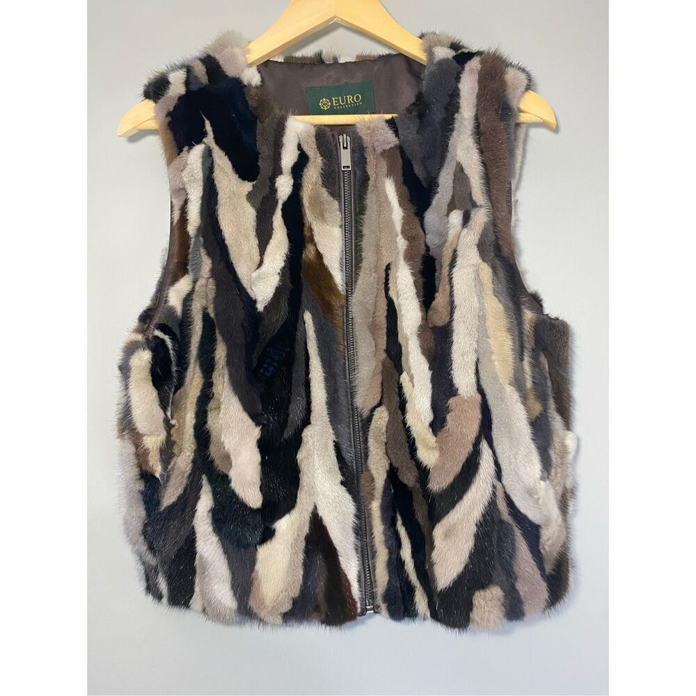 Medium, Euro Collections, unique fur vest, with leather trim. Like new condition